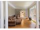 Inviting living room with hardwood floors, beautiful window and shelving at 1029 Laurel Grove Cts, Suwanee, GA 30024
