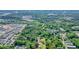 Wide overhead view of the home and community circled in red close to a city at 110 Barnesdale Ter, Woodstock, GA 30188