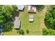 A high-angle aerial shot of the home and boundary in a neighborhood filled with trees at 110 Barnesdale Ter, Woodstock, GA 30188