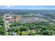 An aerial view showcasing the property's setting near green spaces and residential areas at 110 Barnesdale Ter, Woodstock, GA 30188