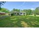 Quaint single-story home with a well-manicured front lawn and classic curb appeal at 110 Barnesdale Ter, Woodstock, GA 30188