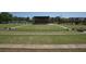 A picturesque outdoor park with an amphitheater and expansive green space for community events and recreation at 110 Barnesdale Ter, Woodstock, GA 30188