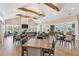Open-concept gathering room that connects the kitchen and other seating areas, perfect for social events at 3462 Fishpond Cir, Dacula, GA 30019