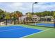 Get your game on at the community's pickleball courts, surrounded by trees and other amenities at 3462 Fishpond Cir, Dacula, GA 30019