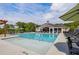 Enjoy the community pool with its ample seating, umbrellas, and spacious deck for residents to relax at 3462 Fishpond Cir, Dacula, GA 30019