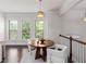 Cozy breakfast nook with round table and natural light at 3585 Adelaide Xing, Brookhaven, GA 30319