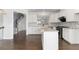 Modern kitchen features white cabinets, mosaic backsplash, granite countertops, and stainless steel appliances at 3585 Adelaide Xing, Brookhaven, GA 30319
