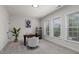 Bright office features neutral paint, soft carpeting, and multiple windows creating a productive workspace at 3585 Adelaide Xing, Brookhaven, GA 30319