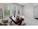 Office featuring a modern desk, large windows for light, and plush carpet at 3585 Adelaide Xing, Brookhaven, GA 30319