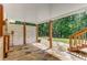 Charming stone patio with direct access to the backyard, featuring a privacy fence and convenient staircase at 3835 Annandale Ln, Suwanee, GA 30024