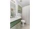 Charming bathroom with a marble countertop vanity and vintage-style fixtures at 3835 Annandale Ln, Suwanee, GA 30024