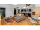 Inviting living area with comfortable seating and a modern kitchenette at 3835 Annandale Ln, Suwanee, GA 30024
