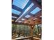 Wood pergola providing shade and ambiance to deck and beautiful wooded backyard view at 3835 Annandale Ln, Suwanee, GA 30024