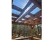 Pergola on deck with view of the backyard trees and surrounding nature at 3835 Annandale Ln, Suwanee, GA 30024