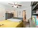 Inviting bedroom with stylish furniture, soft lighting, and a connecting bathroom for added convenience at 100 Chantilly Ln, Fayetteville, GA 30215