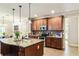Well-equipped kitchen featuring ample counter space, wooden cabinetry, and modern appliances at 100 Chantilly Ln, Fayetteville, GA 30215
