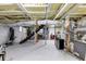 Unfinished basement with visible ceiling insulation and concrete flooring at 1571 Boulevard Lorraine Sw, Atlanta, GA 30311
