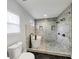 Modern bathroom featuring a soaking tub and a separate tiled shower at 1571 Boulevard Lorraine Sw, Atlanta, GA 30311