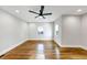 Bedroom with hardwood floors, ceiling fan, recessed lights and two windows at 1571 Boulevard Lorraine Sw, Atlanta, GA 30311