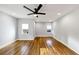Spacious bedroom with hardwood floors, ceiling fan, and recessed lighting at 1571 Boulevard Lorraine Sw, Atlanta, GA 30311