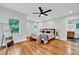 Spacious main bedroom boasts hardwood floors, and a ceiling fan at 1571 Boulevard Lorraine Sw, Atlanta, GA 30311