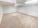 Large finished basement featuring neutral carpet and white paneled walls at 2325 Sebring Sw Ct, Marietta, GA 30064