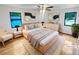 Comfortable bedroom with ample natural light, neutral decor, and hardwood floors at 2325 Sebring Sw Ct, Marietta, GA 30064