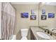 Classic bathroom with a shower-tub combo and a granite countertop at 2505 Oakrill Rd, Marietta, GA 30062