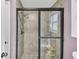 Modern bathroom featuring a glass enclosed shower with a built-in bench at 2505 Oakrill Rd, Marietta, GA 30062