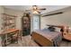 Cozy bedroom offering a ceiling fan, study desk, and abundant natural light at 2505 Oakrill Rd, Marietta, GA 30062