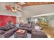 Spacious living room featuring hardwood floors, cozy seating, and seamless access to the dining area at 2505 Oakrill Rd, Marietta, GA 30062