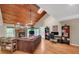 Inviting living room with wood ceiling, fireplace, hardwood floors and a view of the outdoors at 2505 Oakrill Rd, Marietta, GA 30062