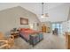 Spacious main bedroom featuring a ceiling fan, a warm carpet, and ample natural light at 2505 Oakrill Rd, Marietta, GA 30062