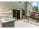View of the wood deck and siding of the home from the back yard of the property at 3453 Dianthus Ln, Lawrenceville, GA 30044