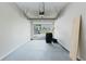 Spacious garage with ample storage, a clean epoxy floor, and an automatic door opener for added convenience at 3453 Dianthus Ln, Lawrenceville, GA 30044