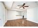 Unfinished basement area with neutral colors, natural light, and a finished bar area at 6300 Mountain Brook Ln, Atlanta, GA 30328