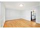 Bright dining room space with hardwood floors and views of the kitchen at 6300 Mountain Brook Ln, Atlanta, GA 30328
