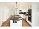 Gourmet kitchen with stainless steel appliances, granite countertops, a stylish island, and abundant storage space at 6300 Mountain Brook Ln, Atlanta, GA 30328