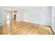 A bright and spacious living room with hardwood floors and large windows at 6300 Mountain Brook Ln, Atlanta, GA 30328