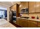 Gourmet kitchen with granite counters, stainless steel appliances, and custom cabinetry, perfect for cooking enthusiasts at 133 Canal St, Hampton, GA 30228