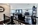 Spacious living room featuring plush seating, a fireplace, and decorative shelving at 133 Canal St, Hampton, GA 30228