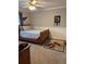 Neutrally decorated bedroom featuring a comfortable bed and natural light at 1502 La Fayette Pl, Loganville, GA 30052