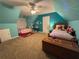 A cozy bedroom with two beds, soft lighting and a ceiling fan at 1502 La Fayette Pl, Loganville, GA 30052