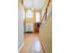 Grand foyer with hardwood floors, soaring ceilings, and a staircase with wood banister at 1996 Wellesley Trce, Atlanta, GA 30338