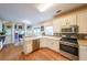 Spacious kitchen with stainless steel appliances, granite countertops, and natural light at 1996 Wellesley Trce, Atlanta, GA 30338