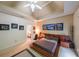 Modern bedroom with neutral decor, tray ceiling, and decorative wall art for a relaxing and stylish atmosphere at 1996 Wellesley Trce, Atlanta, GA 30338