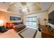 Large bedroom with tray ceiling, big windows, and dark wood accents at 1996 Wellesley Trce, Atlanta, GA 30338