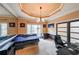 Cozy office space featuring a built-in daybed, large windows, and custom storage, perfect for work or relaxation at 1996 Wellesley Trce, Atlanta, GA 30338