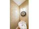 Unique half bathroom with decorative wallpaper and modern sink at 1996 Wellesley Trce, Atlanta, GA 30338