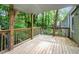 Large wooden deck overlooking a private, wooded backyard at 2025 Venetian Sw Dr, Atlanta, GA 30311